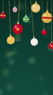 Christmas Ornaments Hanging on Ribbons over Teal Background