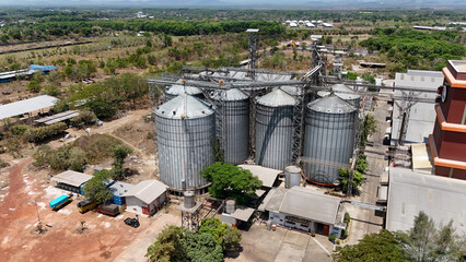 Large industrial grain silos and storage tanks at a facility in South Kalimantan Indonesia © Salsabila Ariadina