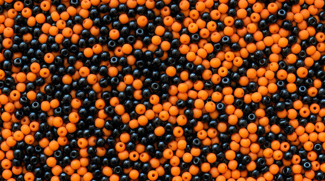 Black and orange small beads background