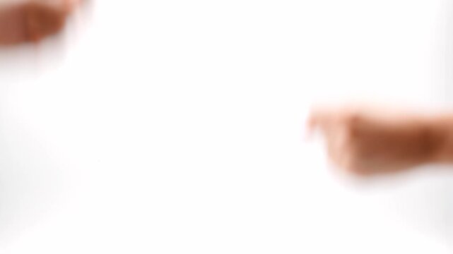 Two hands doing the game rock paper scissors. Hand symbol of playing Rock, Paper, Scissors on a white background.
