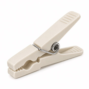 Cream colored plastic clothespin on white background