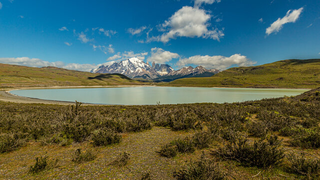 Scenic view of torres del paine national park with snow-capped mountains and blue lake in patagonia