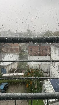 Raindrops on Windowpane During a Stormy Autumn Day 4k