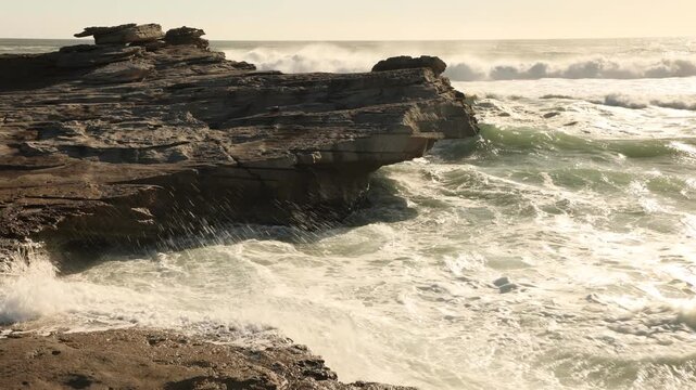 glorious Walker Bay Nature Reserve and massive wave sets, in late afternoon light , South Africa