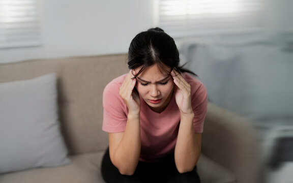 Female Struggling with occupational Stressed, Chronic migraine