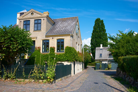 View of the colorful houses in the old town of the fishing village of Dragor, near Copenhagen, Denmark.