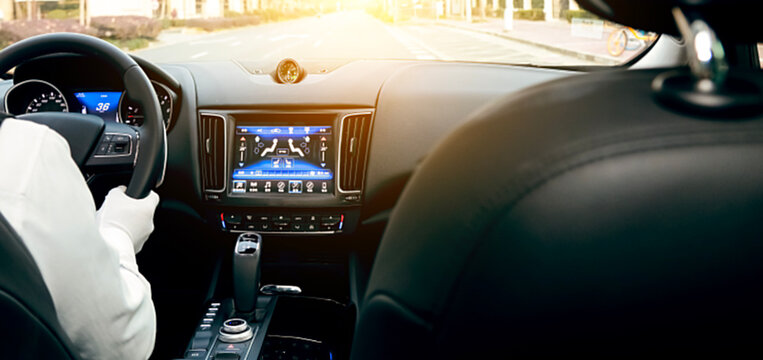 Luxury SUV Interior Driver View at Sunset Urban Road