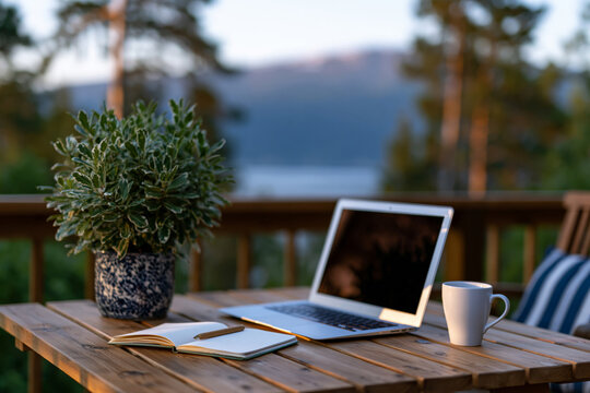 digital nomad writing notes beside a laptop at a quiet lakeside cabin deck, peaceful natural setting, soft sunrise light, minimalist workspace