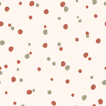 Modern Minimalist Polka Dot Seamless Pattern with Terracotta and Olive Green Irregular Dots on Cream Background, Trendy Abstract Repeat for Fabric, Textile, Wallpaper and Contemporary Home Decor
