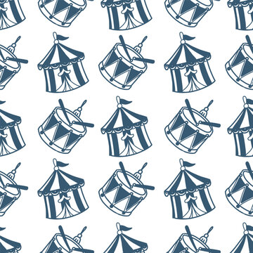 Seamless hand drawn Christmas pattern with festive ornaments, toy drums and hanging decorations in blue on a white background. Winter holiday design for wrapping paper, textiles and stationery.