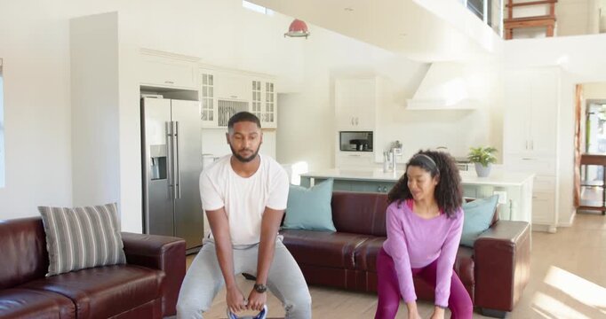Lifestyle videos indoor of people doing activities at home, exercising together, couple using kettle