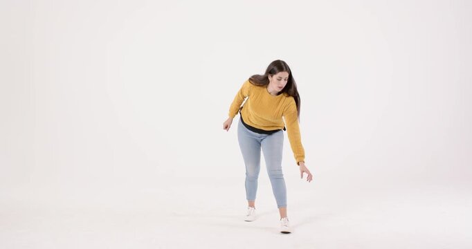 High-speed photography for dynamic scenes, woman standing in casual outfit, expressing emotions with