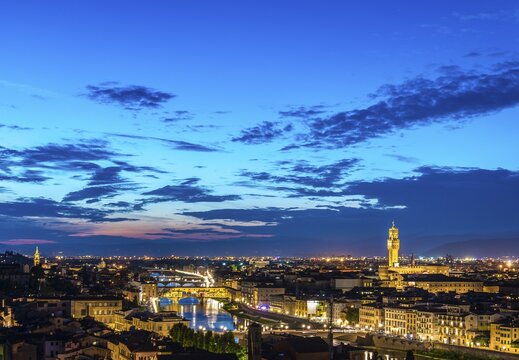 Illuminated city panorama at dusk with Florence Cathedral, Duomo Santa Maria del Fiore with the dome by Brunelleschi, Palazzo Vecchio, Ponte Vecchio, UNESCO World Heritage Site, Florence, Tuscany, Italy