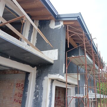 External thermal insulation system currently being installed