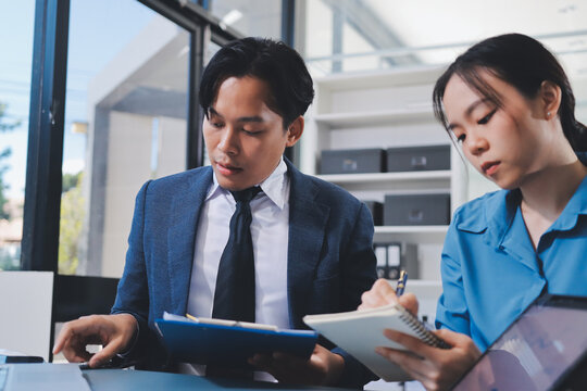 Business professional analyzing financial data on digital tablet dashboard with calculator and laptop, representing accounting software, ERP system integration, performance monitoring.