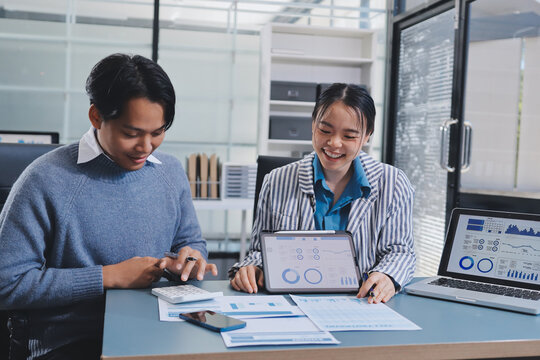 Business professional analyzing financial data on digital tablet dashboard with calculator and laptop, representing accounting software, ERP system integration, performance monitoring.