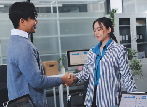 Business professional analyzing financial data on digital tablet dashboard with calculator and laptop, representing accounting software, ERP system integration, performance monitoring.