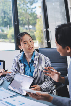 Business professional analyzing financial data on digital tablet dashboard with calculator and laptop, representing accounting software, ERP system integration, performance monitoring.