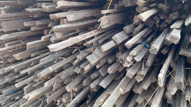 Organized dry firewood logs stack for rustic lifestyle concept