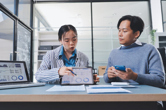Business professional analyzing financial data on digital tablet dashboard with calculator and laptop, representing accounting software, ERP system integration, performance monitoring.