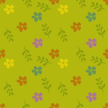 Seamless pattern with cross-stitch embroidery style  colorful flowers and green leaves on a bright chartreuse background. Handcrafted needlework texture design for textile, fabric, wallpaper