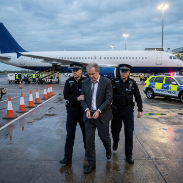 Man In Handcuffs Arrested At Airport By Police Escorted Off Plane