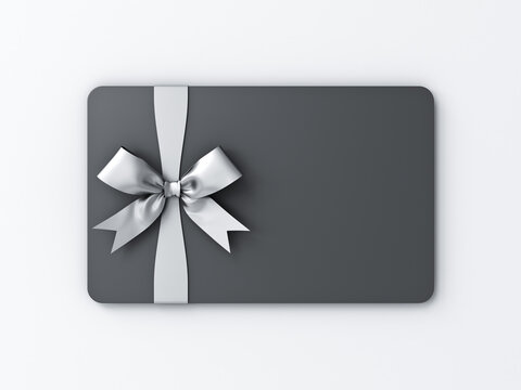 Blank black business gift card or bonus voucher mock up with silver ribbon bow isolated on white gray background with shadow minimal conceptual 3D rendering