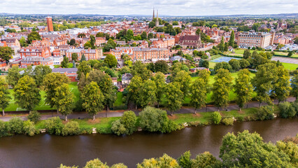 Aerial view of the market town of Shrewsbury in Shropshire, UK with the River Severn in the foreground and houses and church spires in the background © Richard O'Donoghue