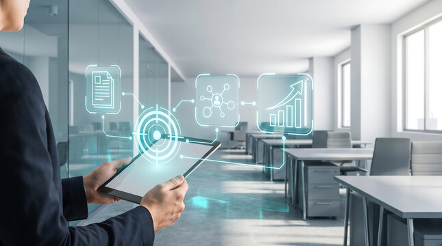 Business professional using a tablet to interact with digital data visualization in a modern corporate office environment
