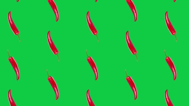 Red chili motion vibrant pattern, spicy peppers scattered on green background, playful arrangement, modern flat style, energetic and dynamic food concept.