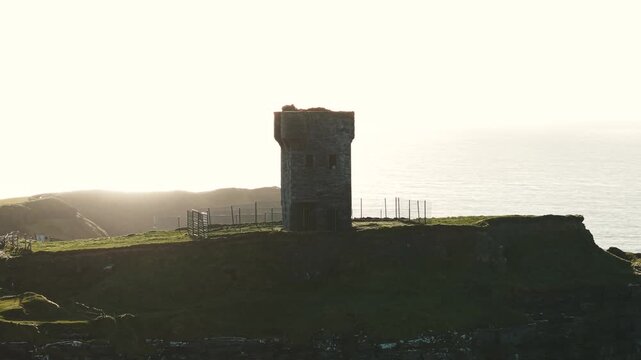 Drone Shot of Moher Tower on Hag's Head Cliffs, Medieval Landmark of County Clare, Ireland