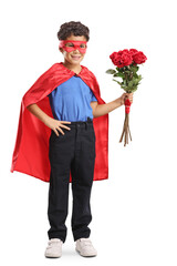 Full length portrait of a boy in a superhero costume holding a bouquet of red roses © Ljupco Smokovski