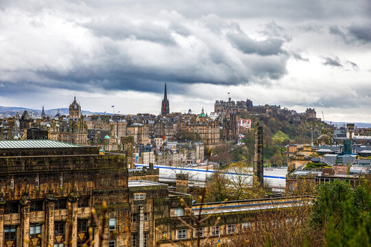 Panoramic skyline of Edinburgh with Edinburgh Castle under dramatic clouds