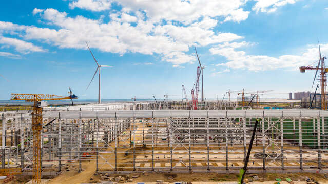 Construction Site With Wind Turbines Under Clear Sky