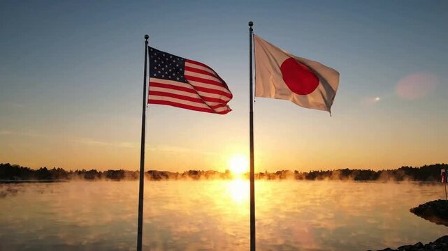Usa and japan flags waving together at sunrise over misty lake international diplomacy and partnership concept