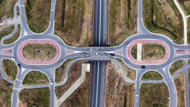 Aerial view of a highway interchange with dual roundabouts in Oosterwolde, the Netherlands