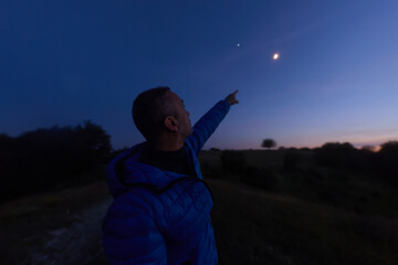 Amateur astronomer observing stars, planets and other celestial objects. © astrosystem