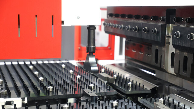 An industrial CNC hydraulic press brake