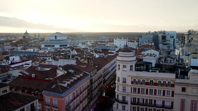 Aerial madrid cityscape with historic buildings at sunset
