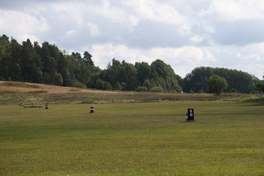 Green grass on a golf driving range with distance markers. In S&ouml;dert&auml;lje Sweden.