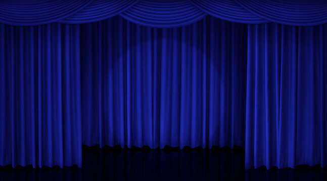 Rich blue curtains framed the cinema stage at the top, creating a backdrop.