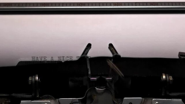Macro Shot of Vintage Typewriter Typing the Words HAVE A NICE TRIP