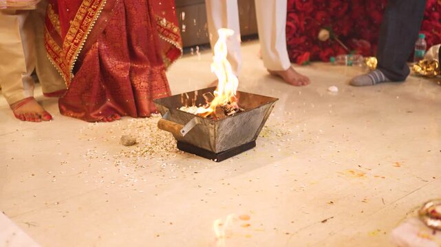 Indian couple performing sacred havan fire ritual during wedding in Ghaziabad