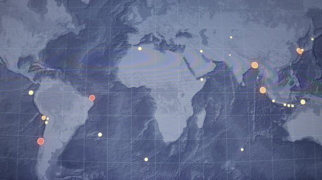 Camera shot of computer screen monitor showing worldwide seismic monitoring display glowing earthquake indicators scientific data. Visible monitor pixels geology disaster research broadcast use.