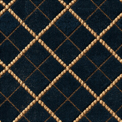 Obraz premium Seamless pattern navy blue velvet fabric forming a diamond pattern with intersecting golden ropes, creating a luxurious quilted background texture