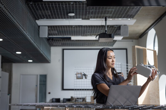 Innovative woman exploring Virtual Reality technology