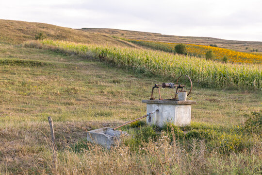 Rural water well for livestock in agricultural field in Romania