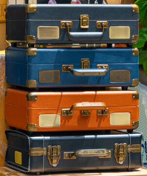 Stack of vintage suitcases with historical charm and retro travel aesthetic for tourism concept