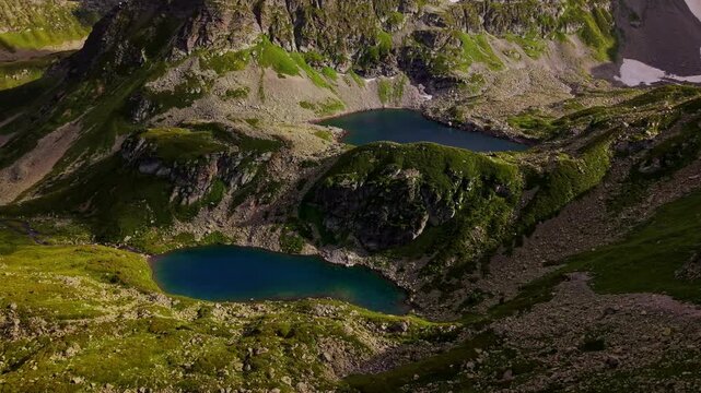 Two High-Altitude Alpine Lakes in Rocky Mountain Terrain