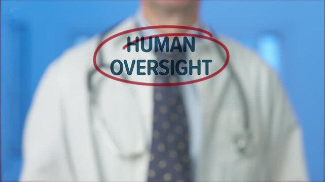 Doctor hand outlining human oversight text on a clear display, emphasizing the critical need for human control and ethical considerations in artificial intelligence and technology development